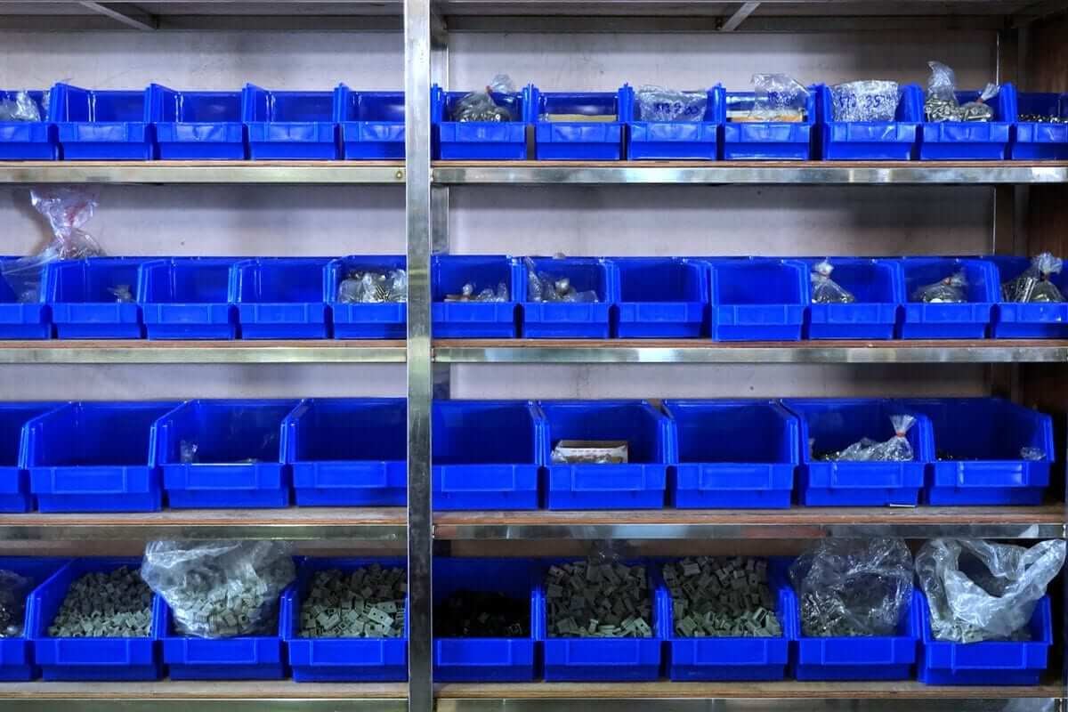 hardware nails, screws, and more in bins on shelves