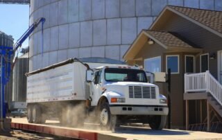 white semi truck on a truck scale